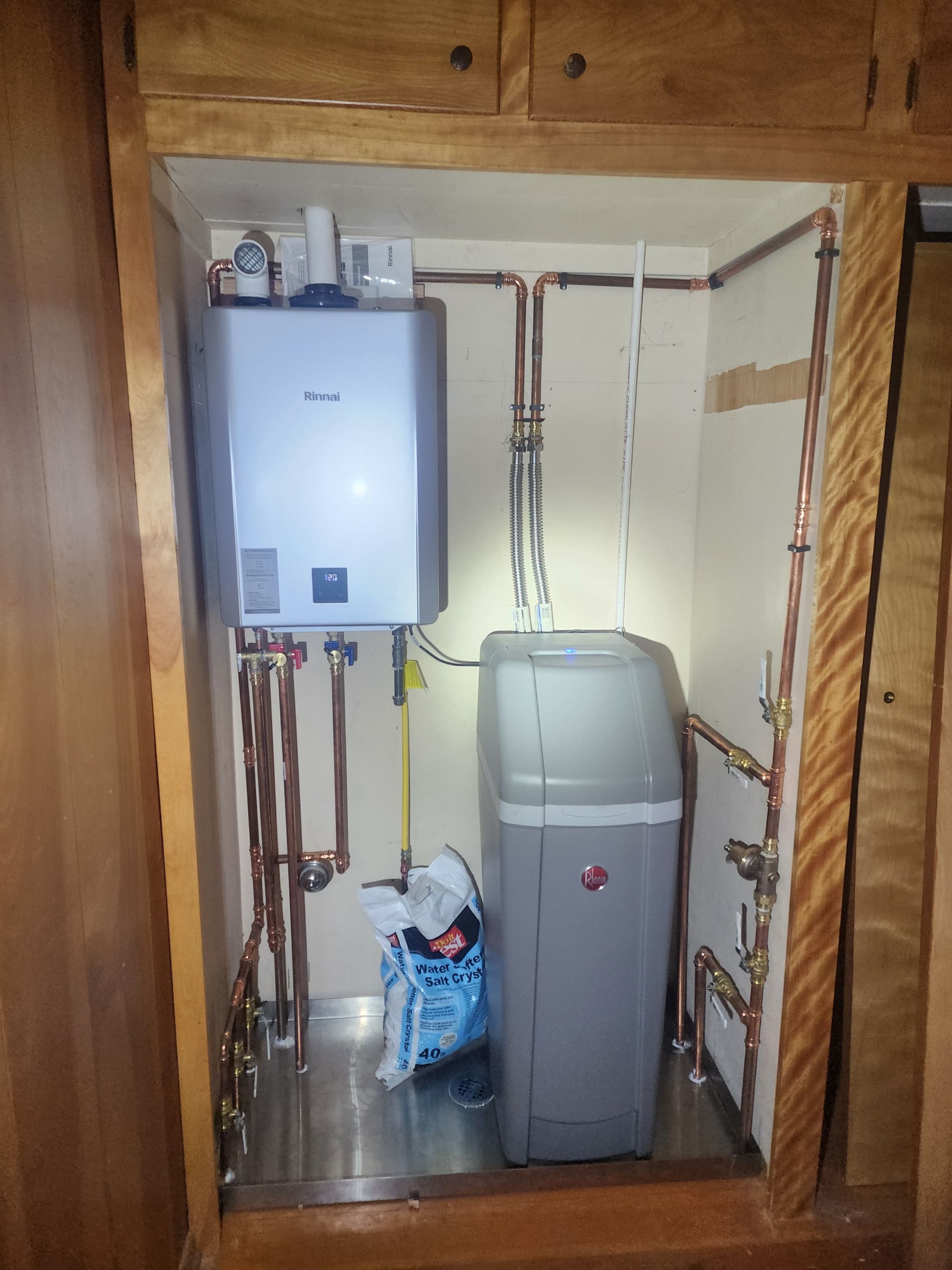 Custom Mechanical Closet Built Around Tankless Water Heater and Softener image