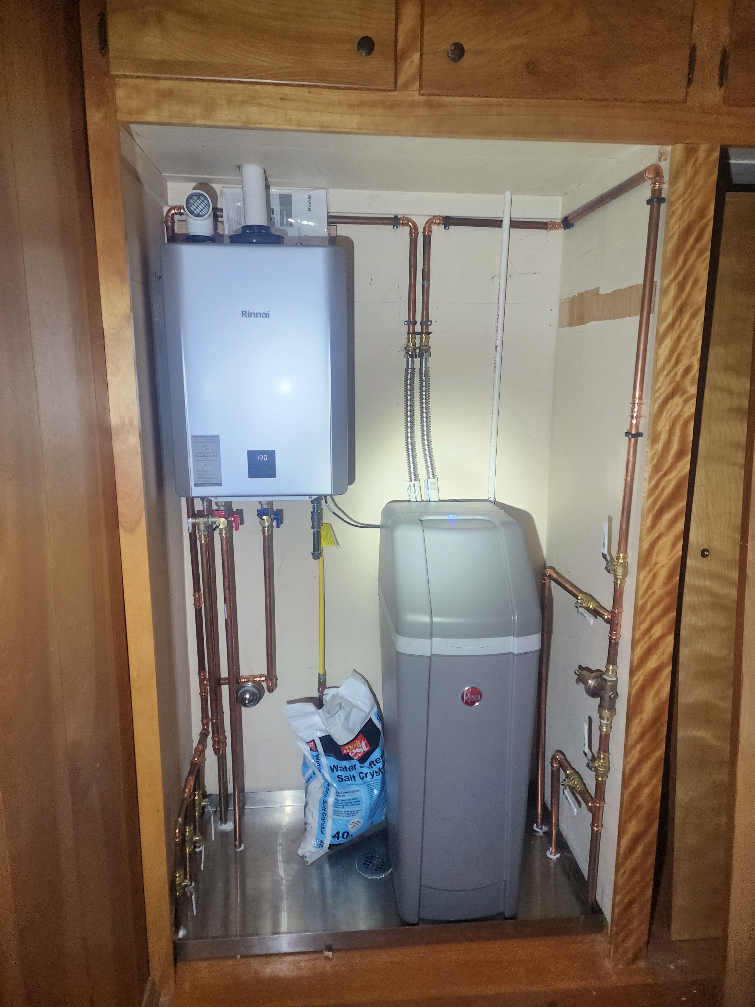 Project Custom Mechanical Closet Built Around Tankless Water Heater and Softener image